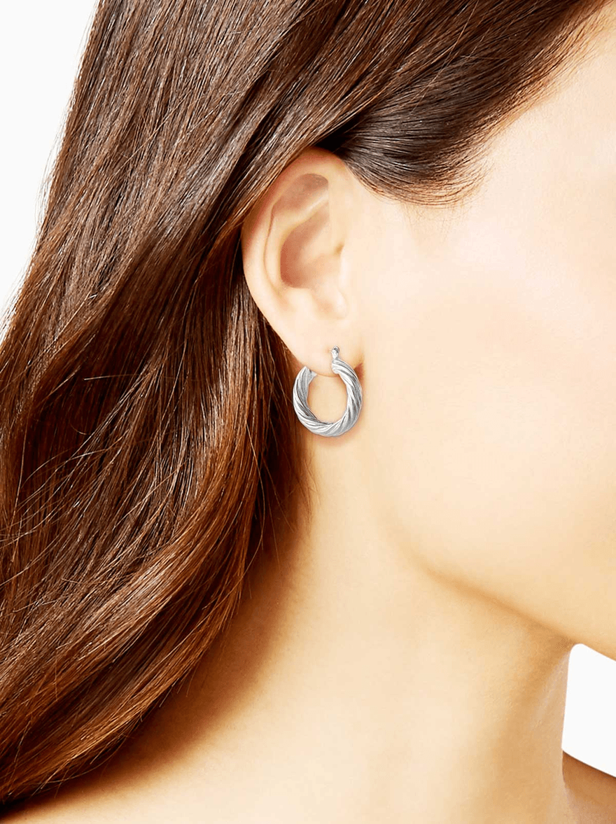 Jessica Simpson Thick Twisted Hoop Earrings in Silver